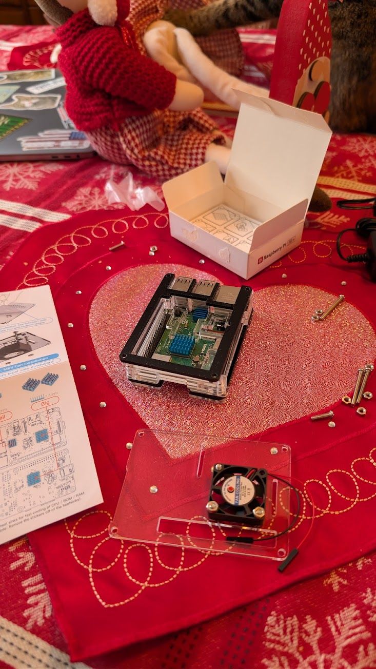 Raspberry Pi sitting on table, getting ready to be configured